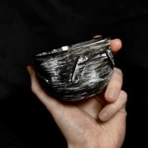 Black and White Etched porcelain cup with Oblong relief design