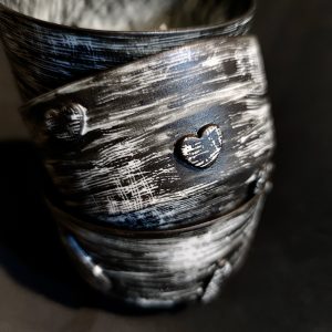 Black and White Etched porcelain cups with Heart relief design stack