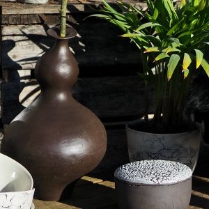 Hand Sculpted smooth dark clay Decorative Vase